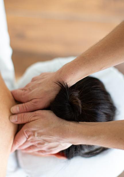 A massage therapist treating a client.